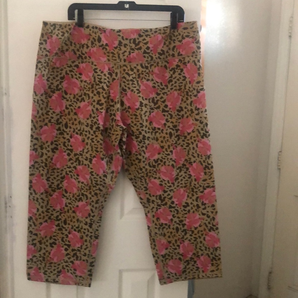 Renee’s reversibles 2 in one cropped pants. One side flowers other side tan